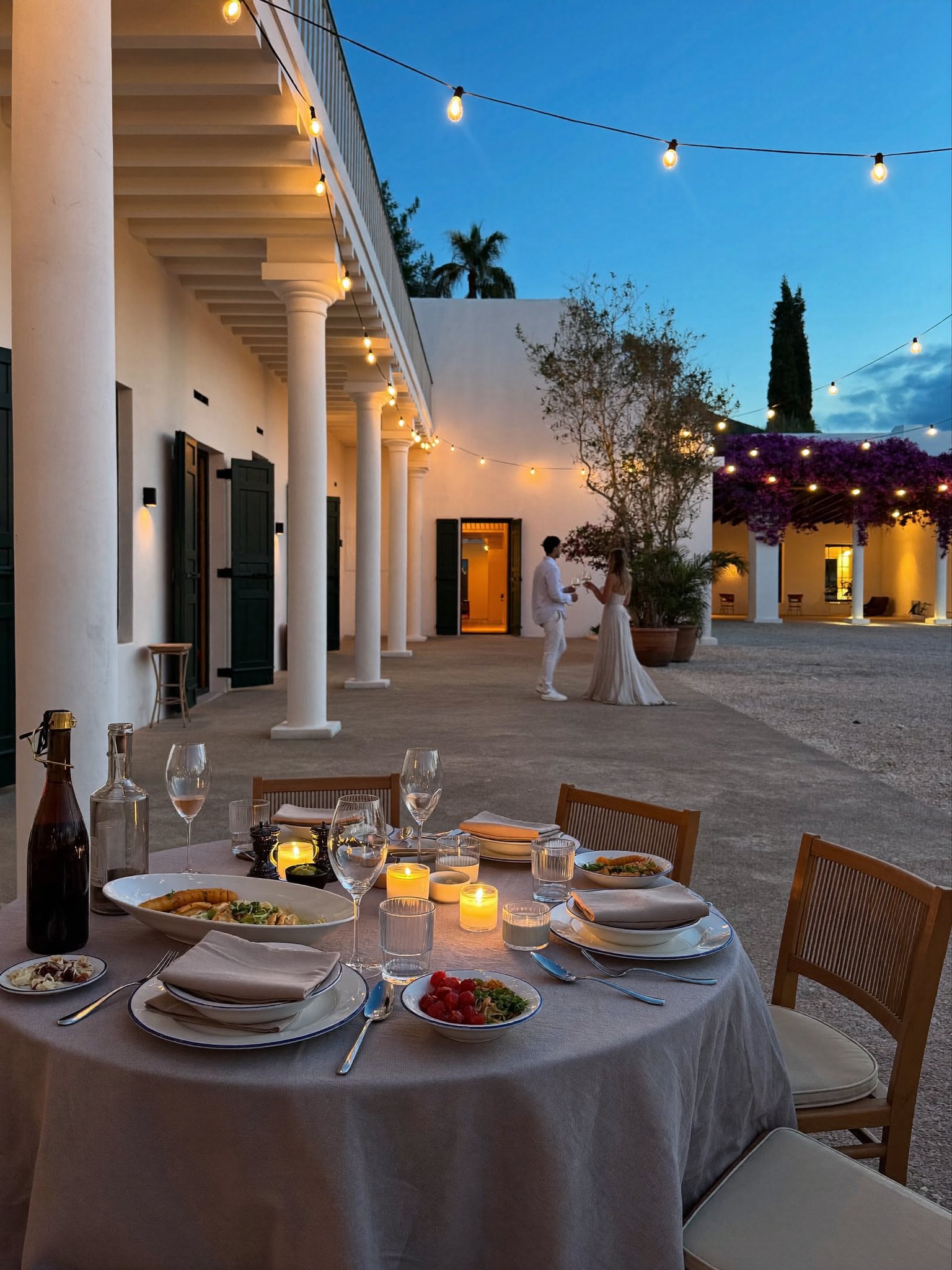 Courtyard dinner at blue hour